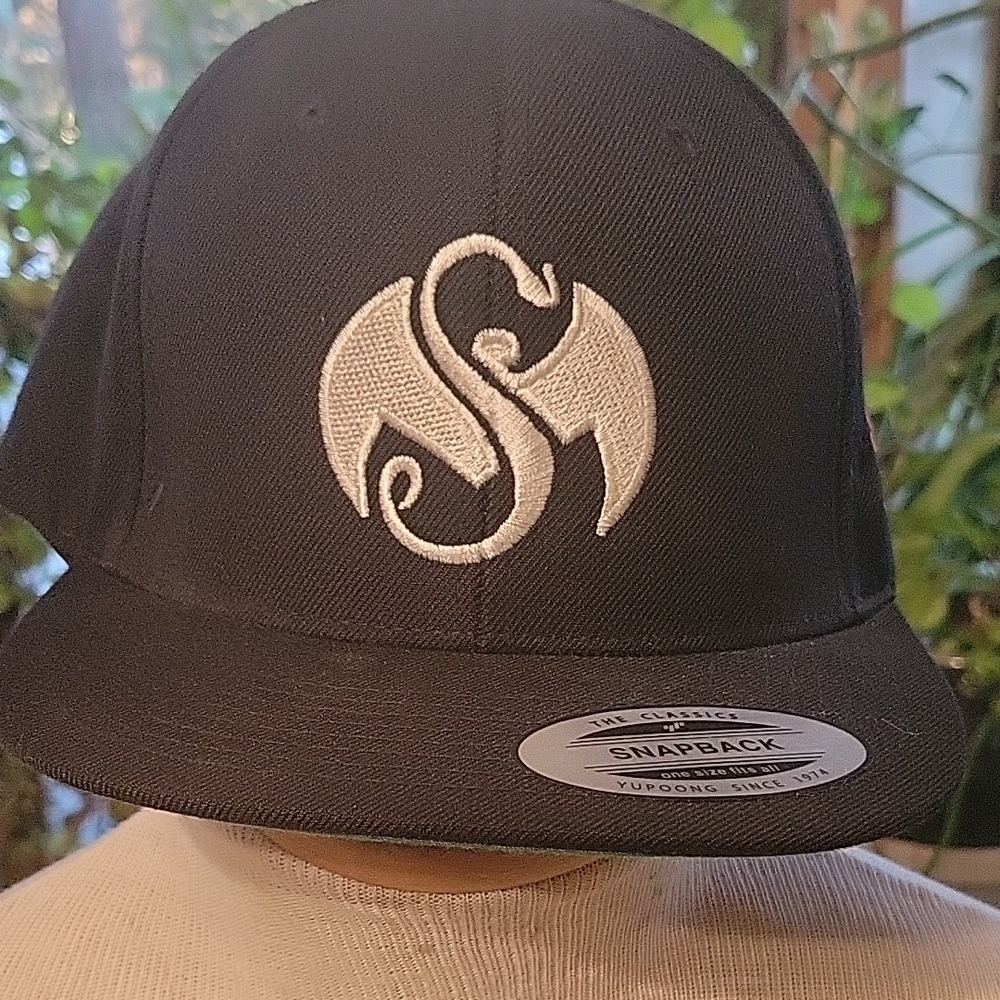 Black Strange Music hat signed